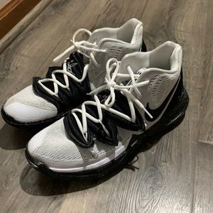 Mens size 12 Kyrie Basketball shoes. Black and white